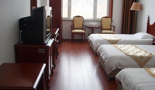 Habitación triple Deluxe