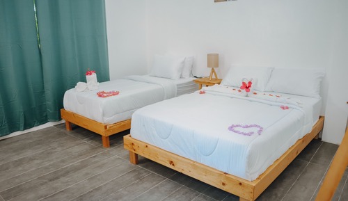 Habitación Deluxe con 2 camas individuales, vistas parciales al mar