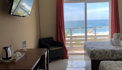 Habitación con 2 camas individuales, frente al mar (For 4 Pax)