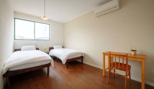 Habitación con 2 camas individuales
