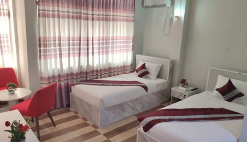 Habitación junior con 1 cama doble o 2 individuales