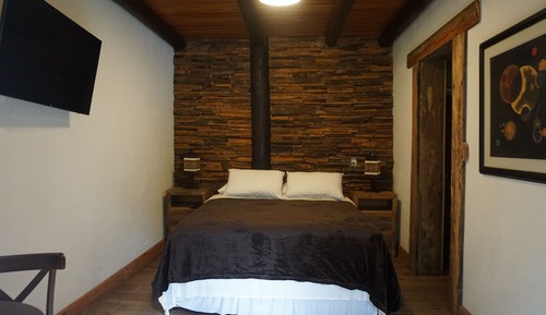 Habitación superior con 1 cama doble o 2 individuales