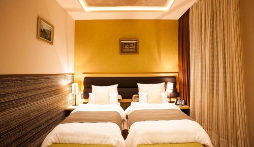 Habitación estándar con 1 cama doble o 2 individuales