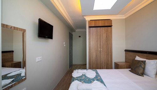 Habitación estándar con 1 cama doble o 2 individuales