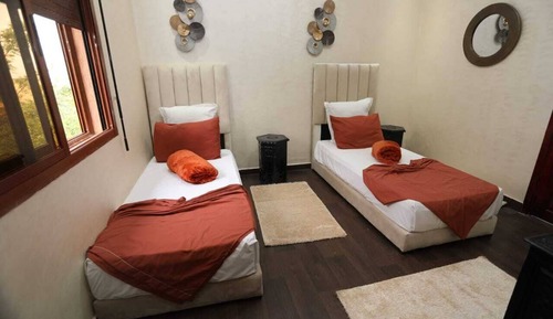 Habitación con 2 camas individuales