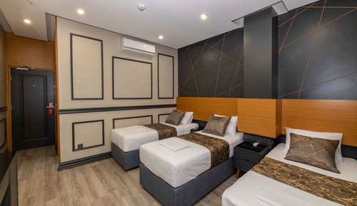 Habitación triple Deluxe
