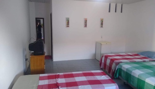 Habitación cuádruple, varias camas