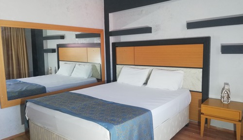 Habitación estándar con 1 cama doble o 2 individuales