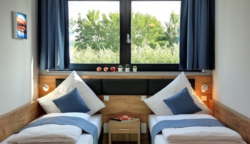 Habitación estándar con 1 cama doble o 2 individuales