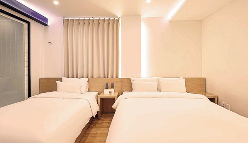 Habitación triple Deluxe