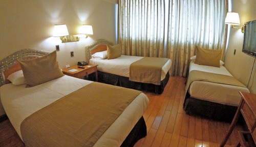 Habitación triple ejecutiva
