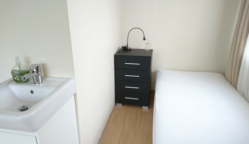 Habitación triple, baño compartido