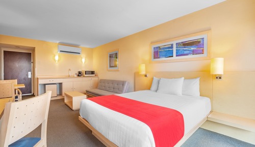 Suite, 1 cama de matrimonio con sofá cama