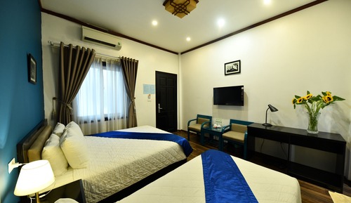 Habitación triple Deluxe (with Internal Window)