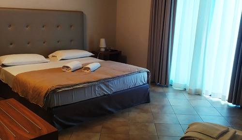 Habitación triple Deluxe, vistas al jardín