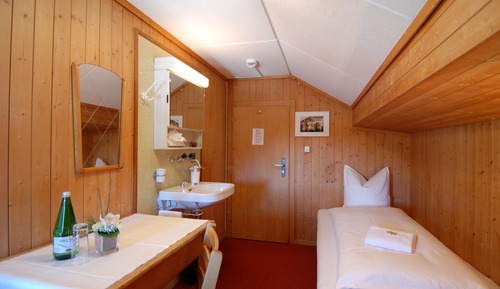 Habitación individual, baño compartido