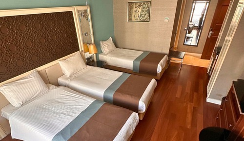 Habitación triple Deluxe