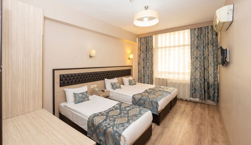 Deluxe Triple Room