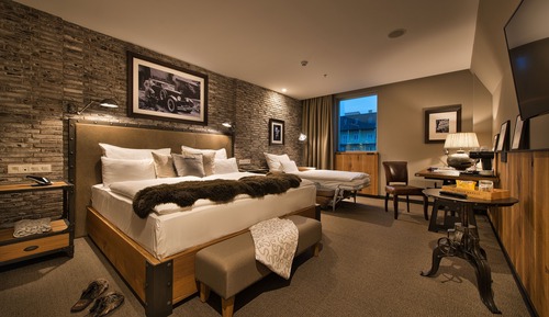Habitación triple Premium, 1 cama de matrimonio grande con sofá cama