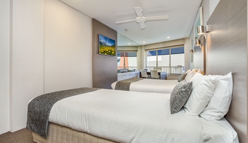Habitación triple, vistas al mar