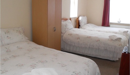 Habitación familiar, varias camas, baño privado