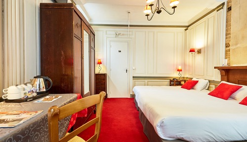 Habitación cuádruple superior, varias camas
