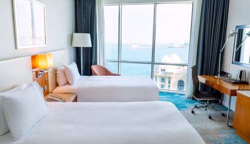 Habitación familiar, vistas al mar (1 King bed / 2 Twin beds)