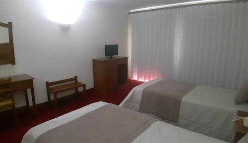 Habitación superior con 2 camas individuales, 2 camas individuales