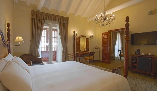 Suite with Street View Balcony 1 King Bed