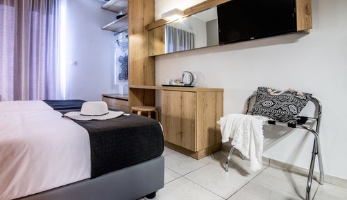 Habitación superior, vistas parciales al mar
