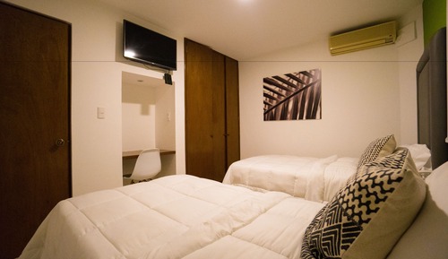 Suite superior, 2 camas de matrimonio, en una planta alta