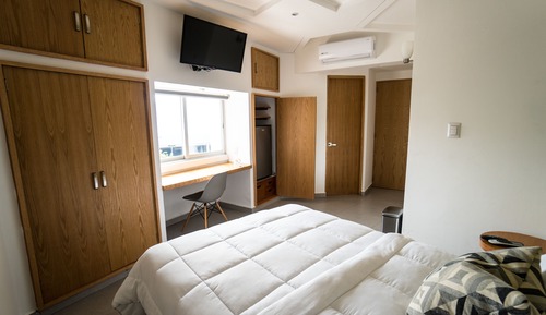 Habitación cuádruple superior, 2 camas dobles, en una planta alta