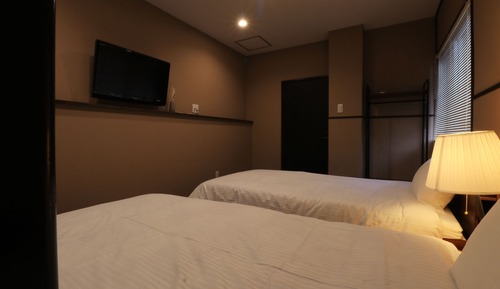 Habitación con 2 camas individuales