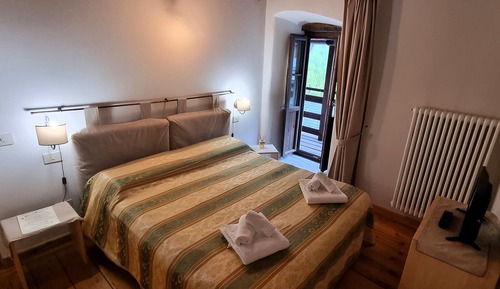 Habitación Deluxe con 1 cama doble o 2 individuales, balcón