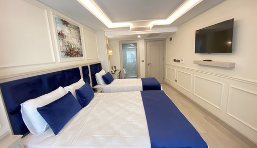 Habitación triple Deluxe