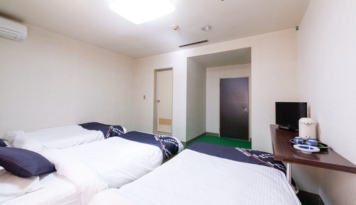 Habitación triple, fumadores