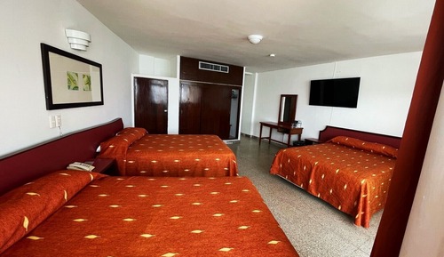 Habitación triple estándar, varias camas