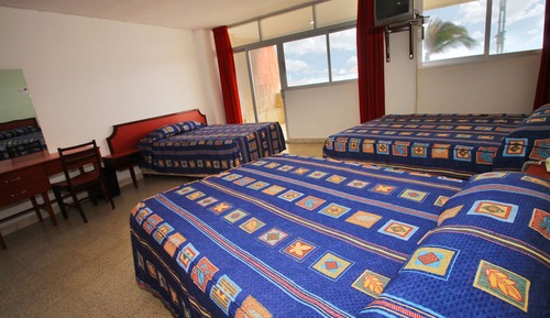 Habitación triple superior, varias camas