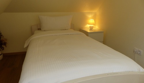 Habitación individual, baño compartido