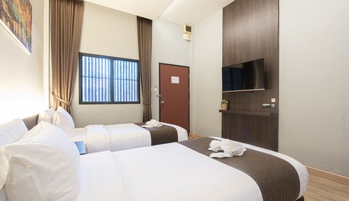 Habitación Signature con 2 camas individuales