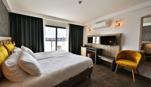 Habitación Deluxe con 1 cama doble o 2 individuales, balcón