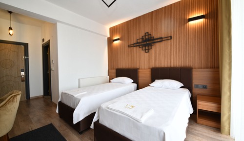 Habitación superior con 1 cama doble o 2 individuales, vistas al mar
