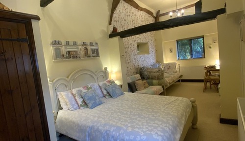 Habitación cuádruple Deluxe, baño privado (The Smithy)