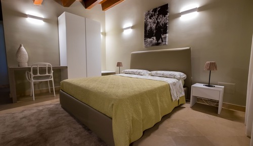 Suite superior, acceso a la piscina, vistas al jardín