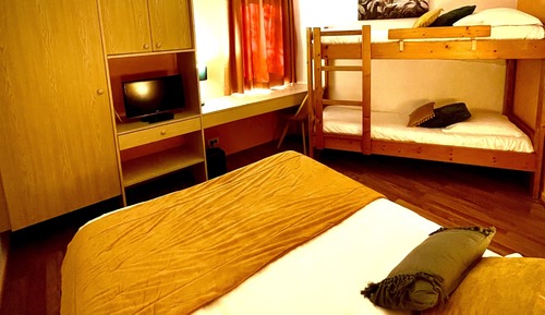 Habitación cuádruple Confort, vistas al jardín