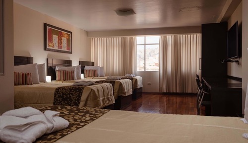 Habitación cuádruple estándar, varias camas