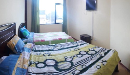 Habitación familiar, varias camas