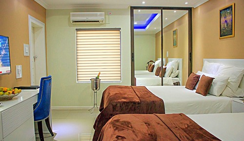 Habitación ejecutiva con 2 camas individuales, vistas al jardín