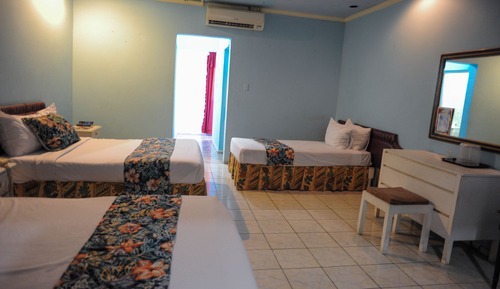 Habitación triple, varias camas, en la zona del jardín