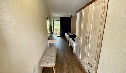 Habitación triple de lujo, vistas parciales al mar